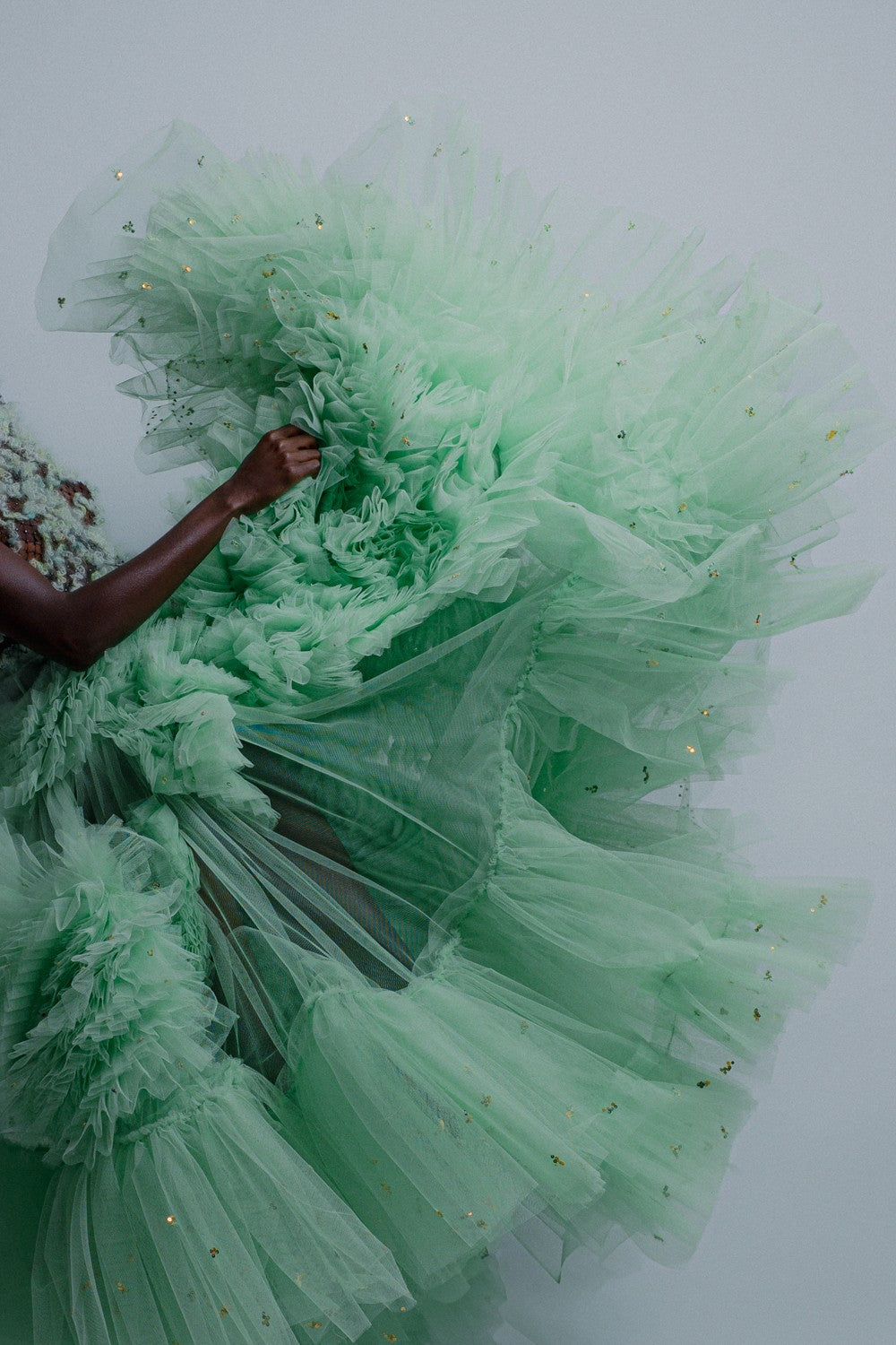 STUDIO183 homepage hero — mint tulle gown detail